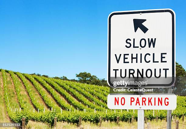 sign - slow vehicle turnout - slow stock pictures, royalty-free photos & images
