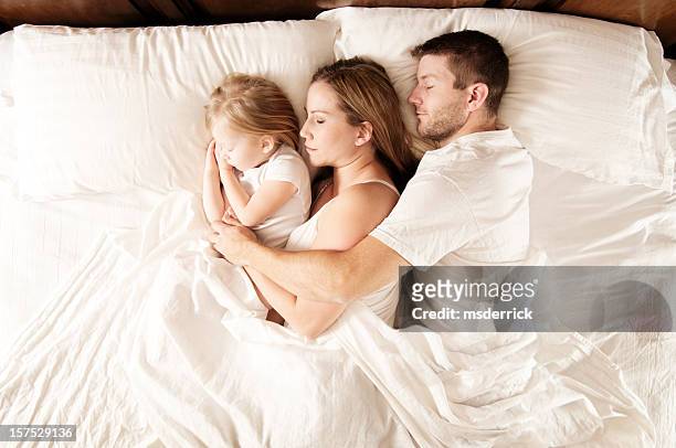 sleeping family - ideal wife stock pictures, royalty-free photos & images