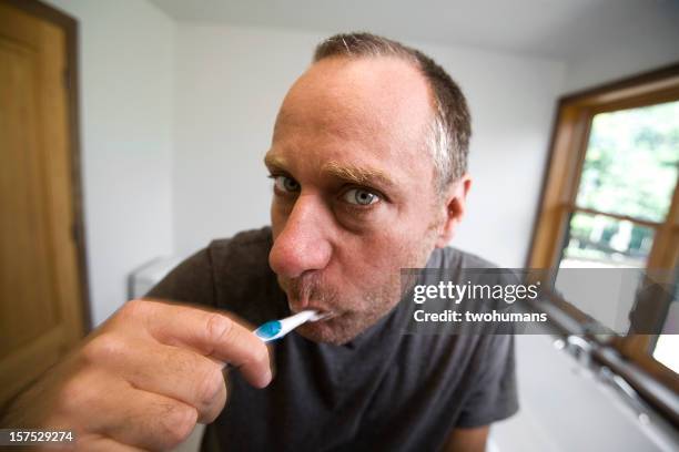 morning business - people brushing their teeth stock pictures, royalty-free photos & images