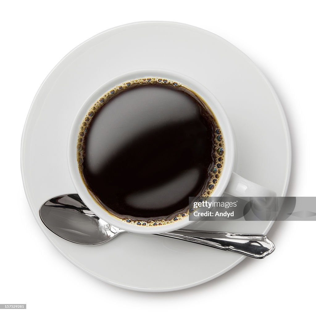 An above shot of black coffee in a white cup 