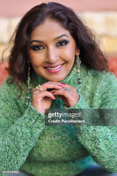 pretty indian woman with green sweater - bangladesh business stock pictures, royalty-free photos & images