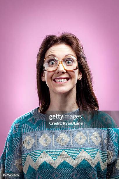 crazy pink 1980s girl and sweater - pulling funny faces stock pictures, royalty-free photos & images