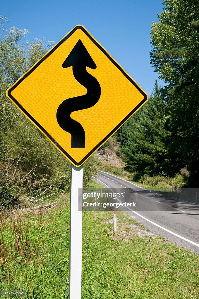 Winding Roda Winding Road Warning Sign High-Res Stock Photo - Getty Images