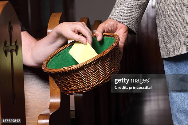 woman tithing - religious offering stock pictures, royalty-free photos & images