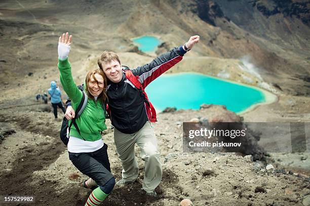 tongariro crossing series - happy couple - north island new zealand stock pictures, royalty-free photos & images