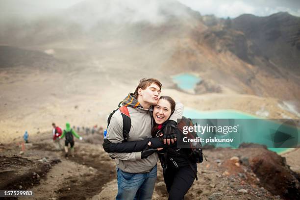 tongariro crossing series - happy couple - north island new zealand stock pictures, royalty-free photos & images