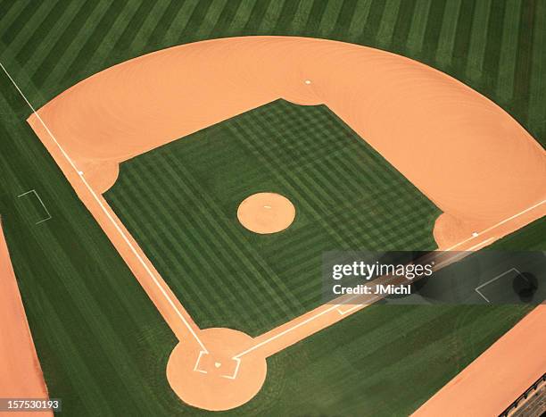 baseball infield photographed from an aerial view. - binnenveld stockfoto's en -beelden