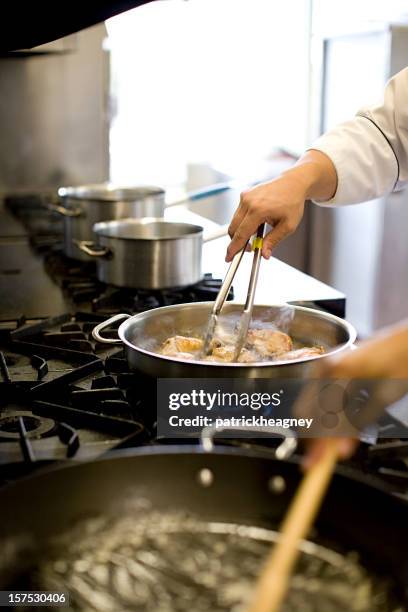 cooking chicken - stir frying european stock pictures, royalty-free photos & images