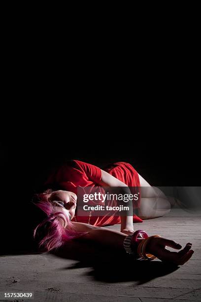 passed out on the floor - dead women stockfoto's en -beelden