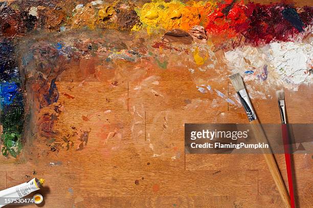 painters palette and brushes. full frame, horizontal. - artist's palette stock pictures, royalty-free photos & images