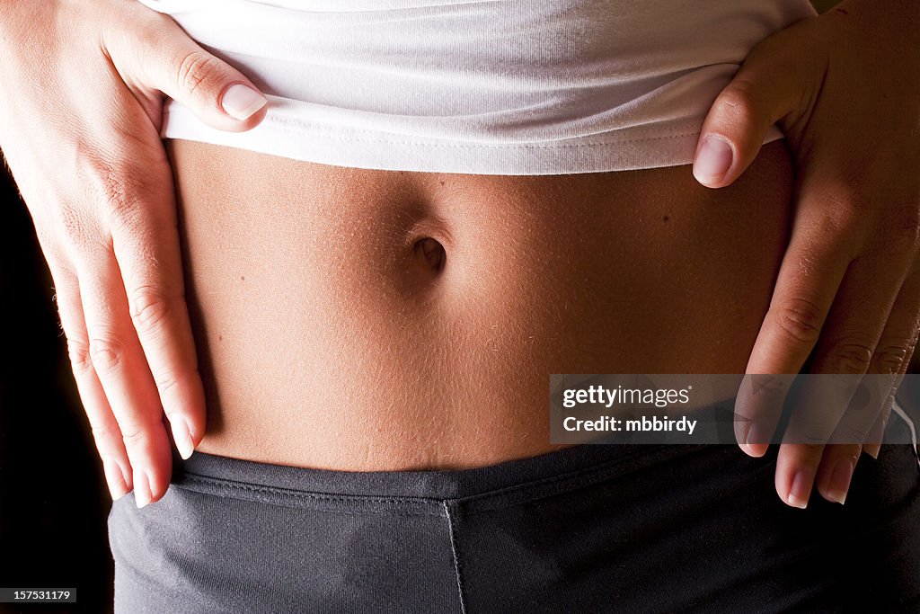Womans Belly High Res Stock Photo Getty Images Womans Belly High Res Stock Photo Getty Images
