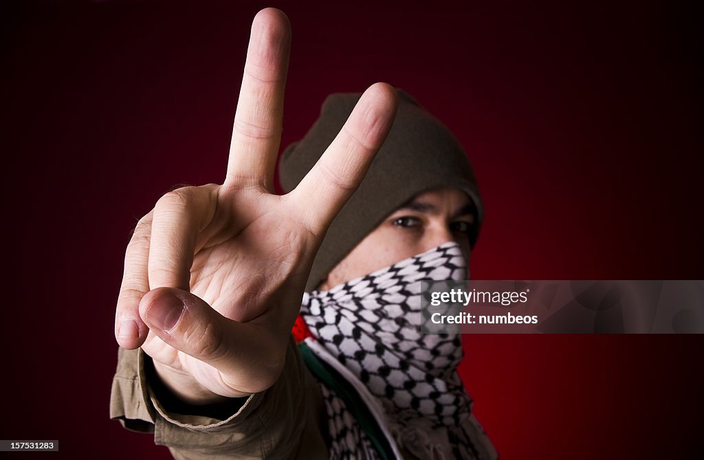 Protestor showing peace sign