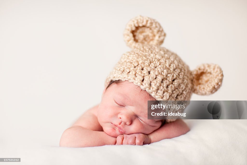 Sleeping Newborn Baby Wearing Knit Hat with Bear Ears