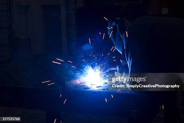 welding sparks - rvs stockfoto's en -beelden