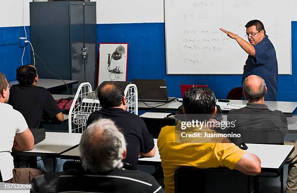 adult training class - automotive technician stock pictures, royalty-free photos & images