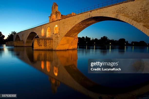 riverside landscape of bridge at saint-benezet - rhone stockfoto's en -beelden