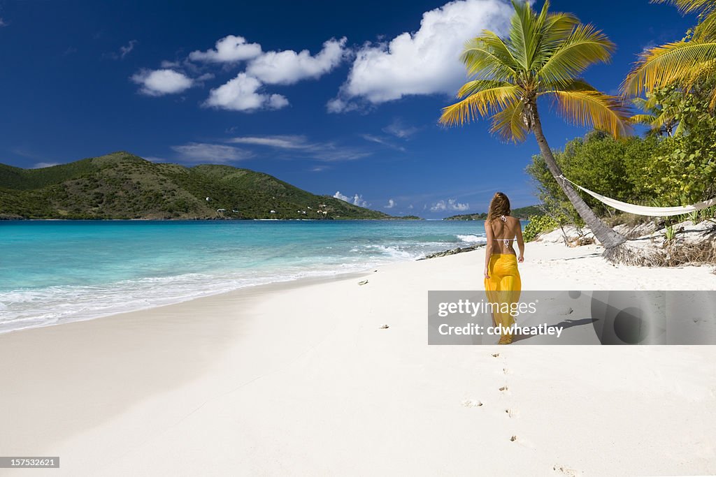 Woman walking on the beach