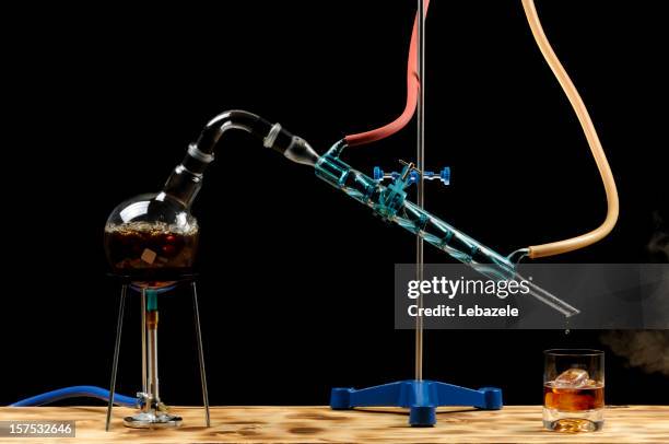 whiskey distillation - bunsen burner stock pictures, royalty-free photos & images