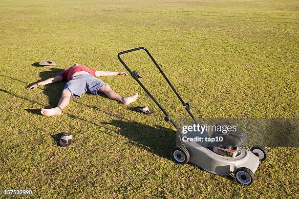 agotado con cortacésped - fainting fotografías e imágenes de stock