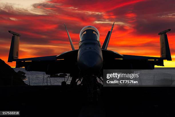 fighter plane at sunset - red plane stock pictures, royalty-free photos & images