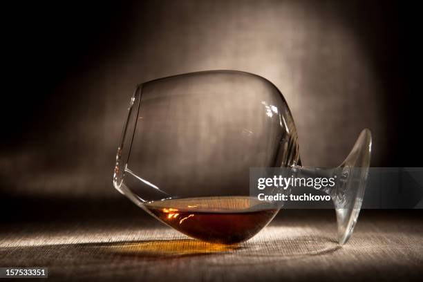 glass of brandy - brandy snifter stock pictures, royalty-free photos & images