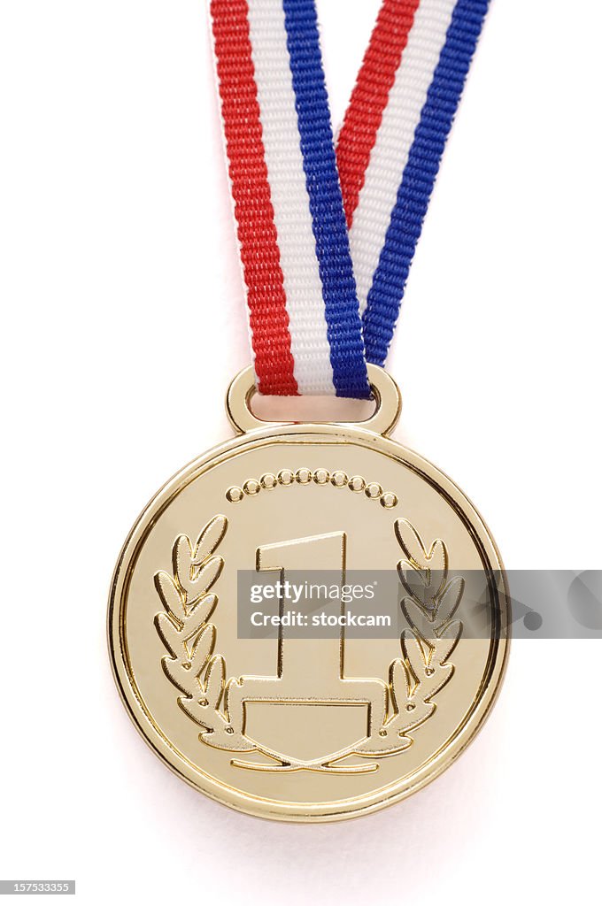 Isolated gold medal with ribbon