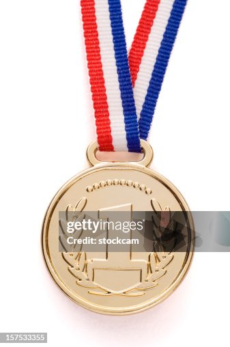 Isolated gold medal with ribbon Isolated gold medal with ribbon