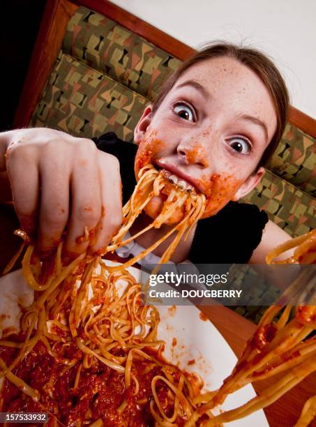Girl Eating Spaghetti With Hands Photos and Premium High Res Pictures ...