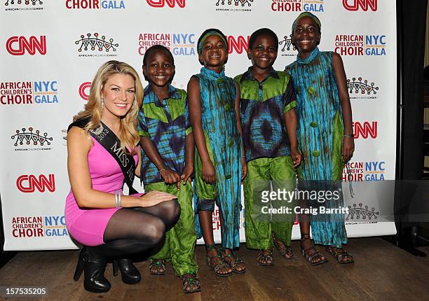 Mallory Hagan and members of the African Children's Choir attend the 4th Annual African Children's Choir Fundraising Gala at City Winery on December...