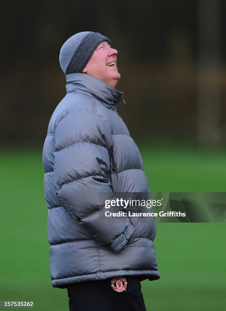 Sir Alex Ferguson of Manchester United looks on during a training session ahead of their Champions League Group H match against CFR 1907 Cluj at...