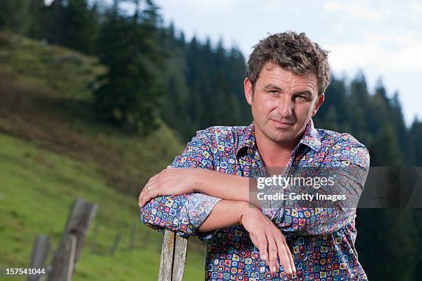 German actor Hans Sigl poses for a picture as he visits the filming location of German-Austrian tv serie 'Der Bergdoktor' on September 17, 2011 in...