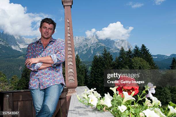 German actor Hans Sigl poses for a picture as he visits the filming location of German-Austrian tv serie 'Der Bergdoktor' on September 17, 2011 in...