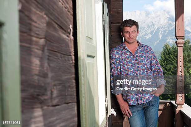 German actor Hans Sigl poses for a picture as he visits the filming location of German-Austrian tv serie 'Der Bergdoktor' on September 17, 2011 in...