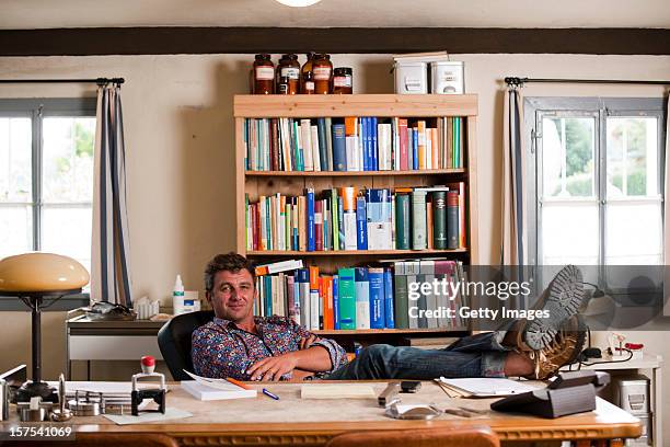 German actor Hans Sigl poses for a picture as he visits the filming location of German-Austrian tv serie 'Der Bergdoktor' on September 17, 2011 in...