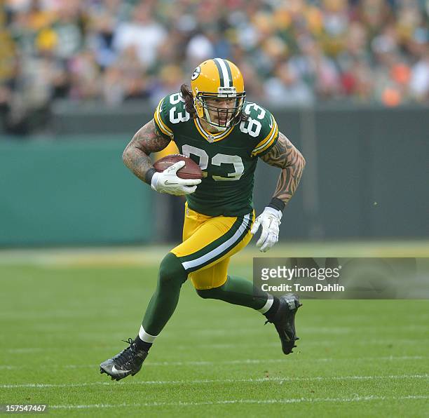 Tom Crabtree of the Green Bay Packers carries the ball during an NFL game against the Minnesota Vikings at Lambeau Field on December 2, 2012 in Green...