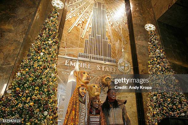 Performers Chondra La-Tease Profit, Lindiwe Dlamini and Alton Fitzgerald White attend the Lighting Ceremony Honoring The 15th Anniversary Of...