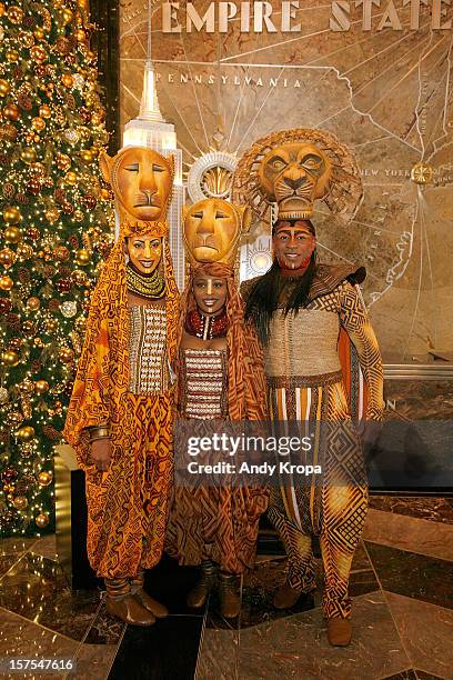 Performers Chondra La-Tease Profit, Lindiwe Dlamini and Alton Fitzgerald White attend the Lighting Ceremony Honoring The 15th Anniversary Of...