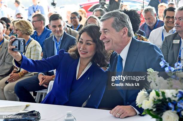 July 28: VinFast CEO Le Thi Thu Thuy, left, and Gov. Roy Cooper participate as Electric carmaker Vinfast breaks ground in its $4B NC manufacturing...