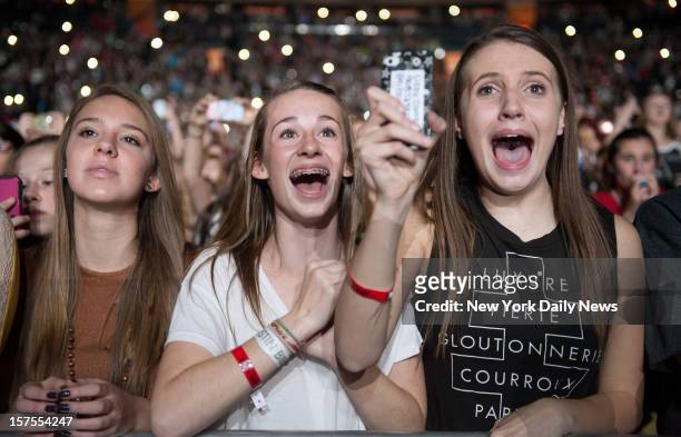 Fans of English-Irish boy band One Direction performs at Madison Square Garden Monday, December 3, 2012.