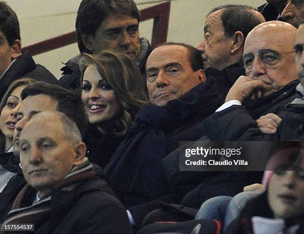 Silvio Berlusconi and Francesca Pascale attend the UEFA Champions League group C match between AC Milan and Zenit St Petersburg at San Siro Stadium...