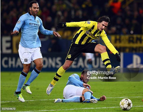 Mats Hummels of Dortmund and Javi Garcia of Manchester battle for the ball during the UEFA Champions League group D match between Borussia Dortmund...
