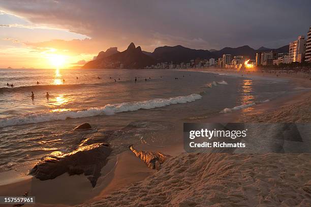 rio de janeiro. ipanema beach at sunset - arpoador beach stock pictures, royalty-free photos & images