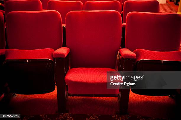 red theater event seating - seat stock pictures, royalty-free photos & images
