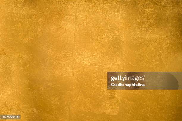 fondo oro scintillante - gold foil texture foto e immagini stock