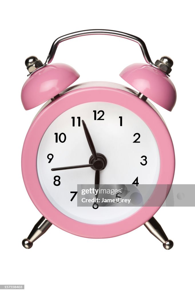 Pink Classic Bell Alarm Clock on White With Clipping Path