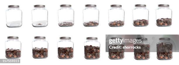 saving your coins series of jar filling - jar stockfoto's en -beelden