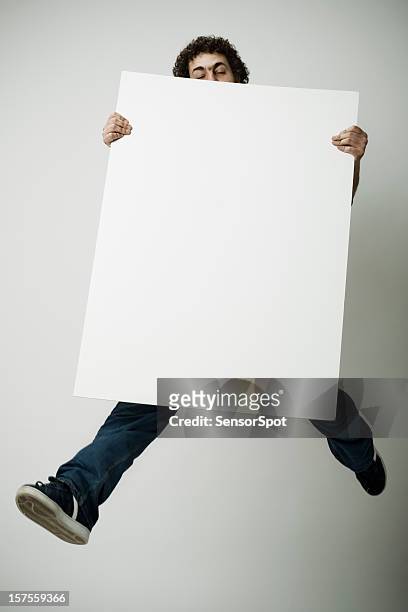 flying with blank poster - holding poster stock pictures, royalty-free photos & images