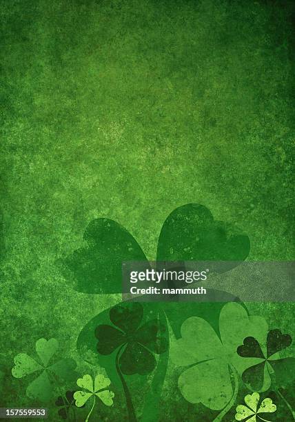 grunge green background with four leaf clovers - st patricks background stock pictures, royalty-free photos & images