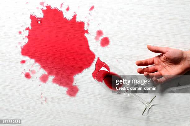 close-up of spilled red wine on the white floor, studio - wine stain 個照片及圖片檔