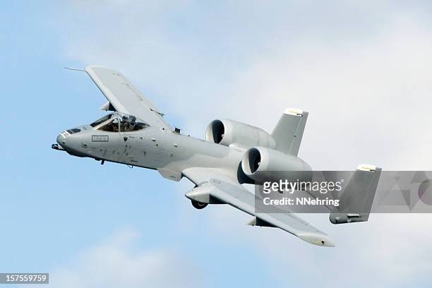 military jet airplane fairchild republic a10 thunderbolt ii warthog flying - a10 warthog stock pictures, royalty-free photos & images